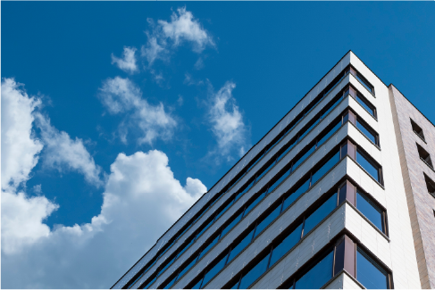 Ideal Client High rise building and clouds